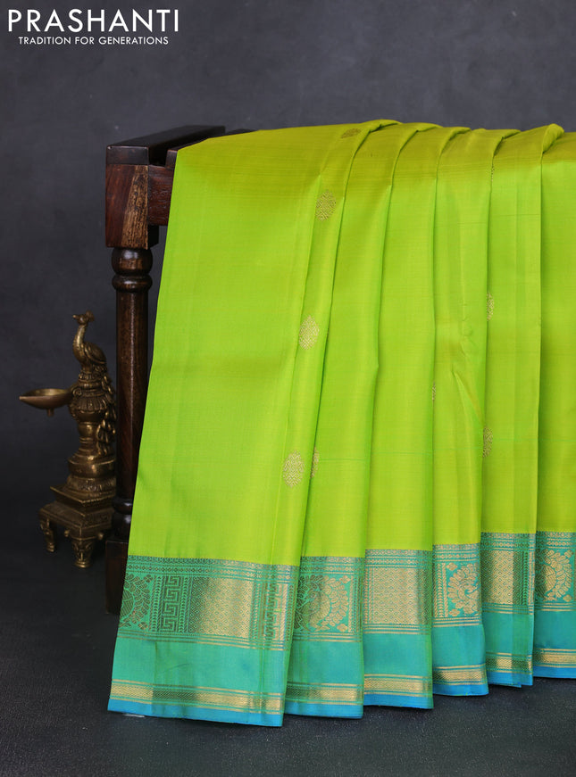 Pure kanchipuram silk saree fluorscent green and dual shade of cs blue with zari woven buttas and rettapet zari woven border