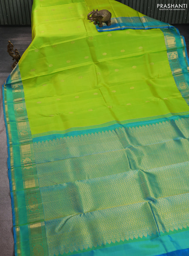 Pure kanchipuram silk saree fluorscent green and dual shade of cs blue with zari woven buttas and rettapet zari woven border