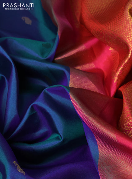 Pure kanchipuram silk saree dual shade of bluish green and dual shade of pinkish orange with paisley zari woven buttas and rich zari woven border
