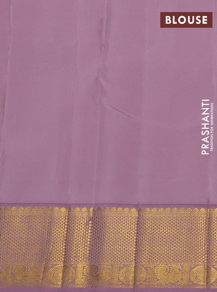 Pure kanchipuram silk saree cream and pastel pink with paisley zari woven buttas and rich zari woven border