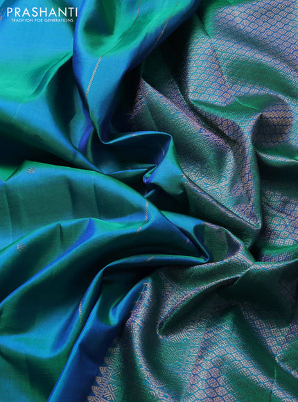 Pure kanchipuram silk saree dual shade of bluish green with zari woven buttas and zari woven border