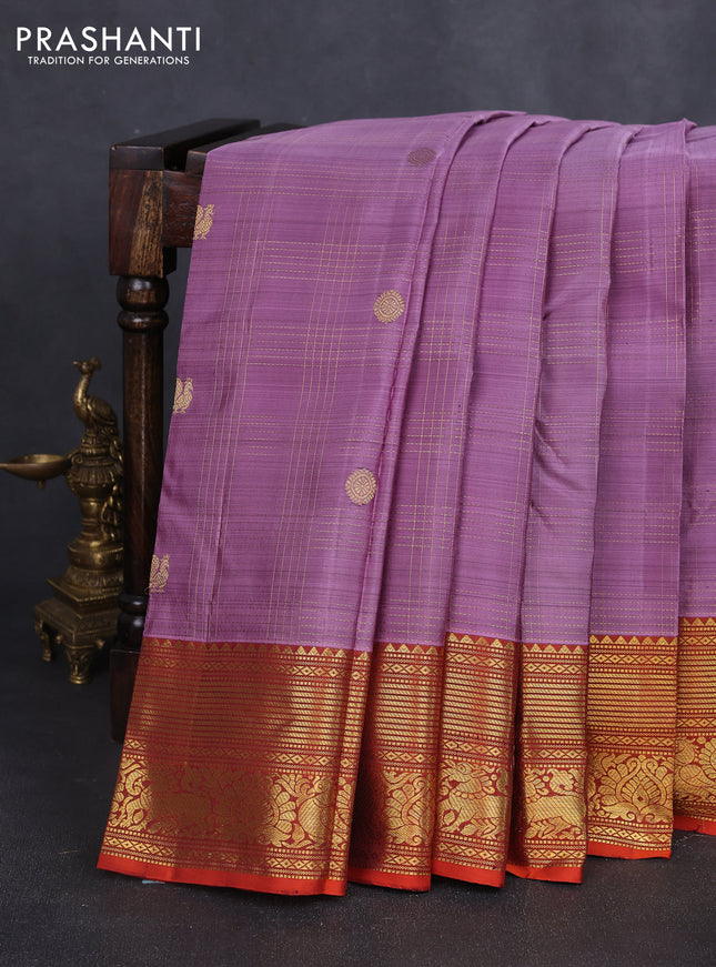Pure kanchipuram silk saree lavender and rustic orange with allover zari checks & buttas and zari woven border