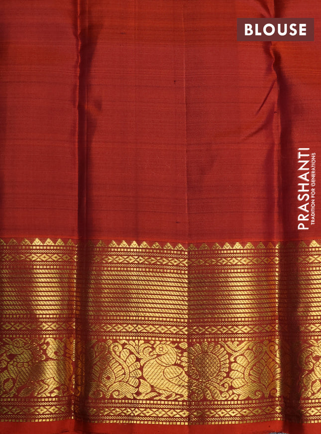 Pure kanchipuram silk saree lavender and rustic orange with allover zari checks & buttas and zari woven border