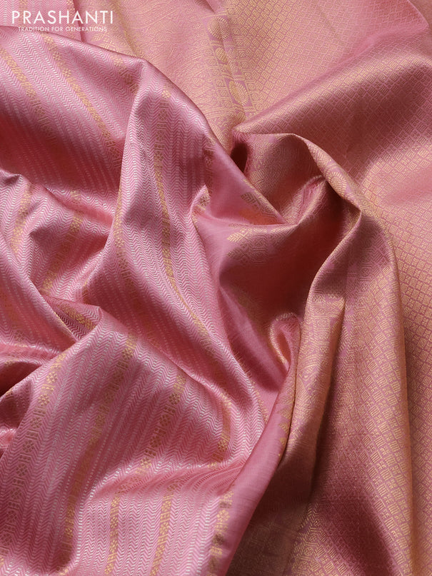 Pure kanchipuram silk saree peach shade with allover silver & gold zari weaves and rich zari woven border