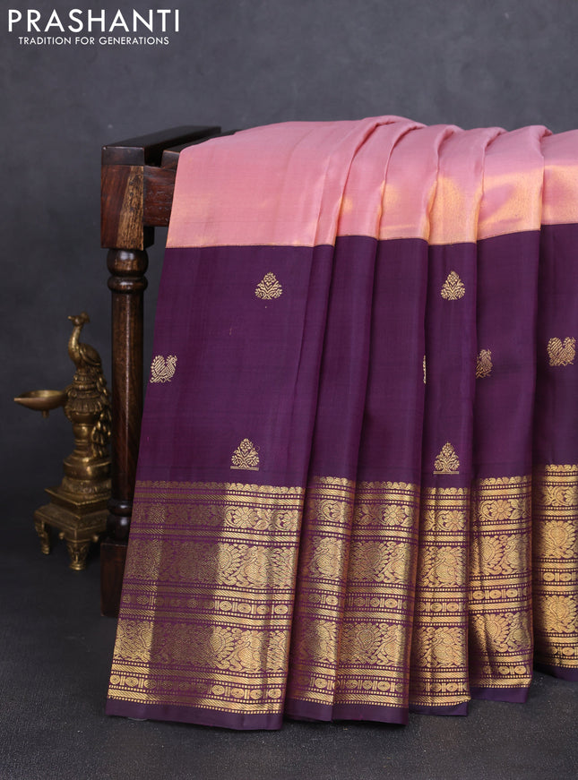 Pure tissue kanchipuram silk saree peach pink and jamun shade with plain body and long zari woven border