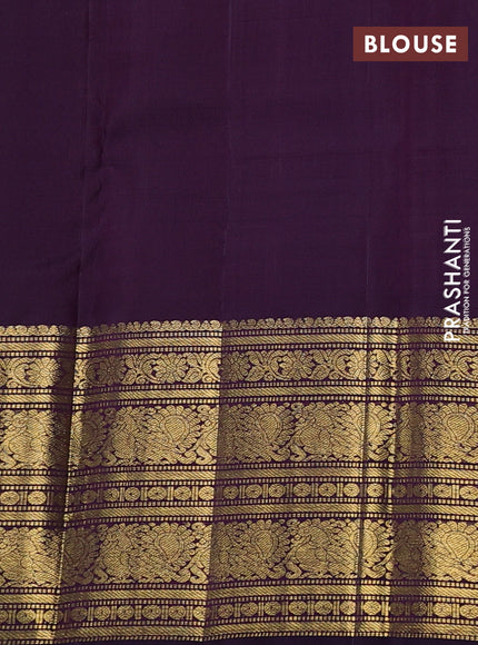Pure tissue kanchipuram silk saree peach pink and jamun shade with plain body and long zari woven border