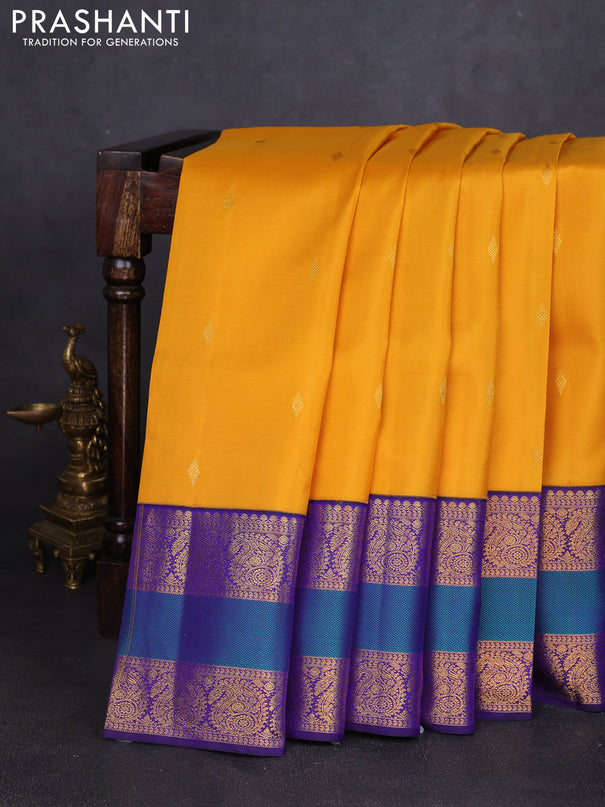 Pure kanchipuram silk saree mango yellow and blue with zari woven annam buttas and long rettapet zari woven border