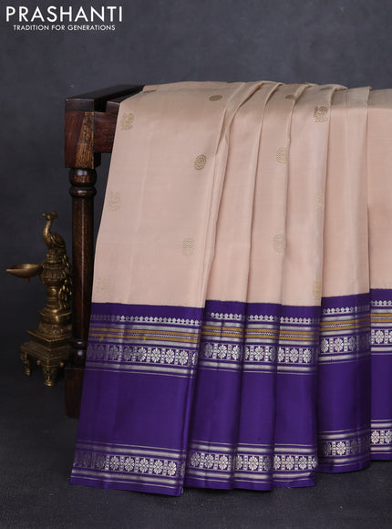 Pure kanchipuram silk saree beige and violet with annam & rudhraksha zari woven buttas and long rettapet zari woven border