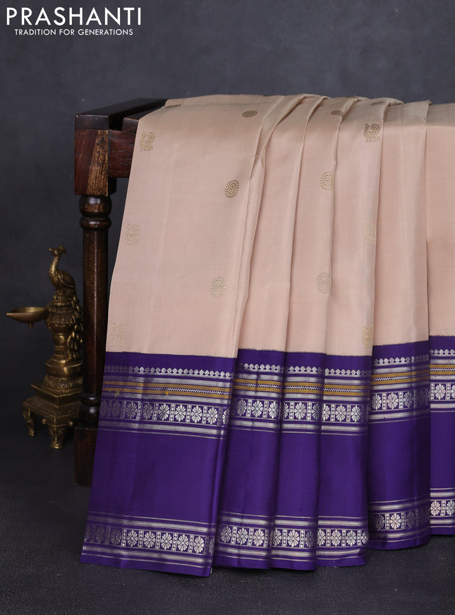 Pure kanchipuram silk saree beige and violet with annam & rudhraksha zari woven buttas and long rettapet zari woven border