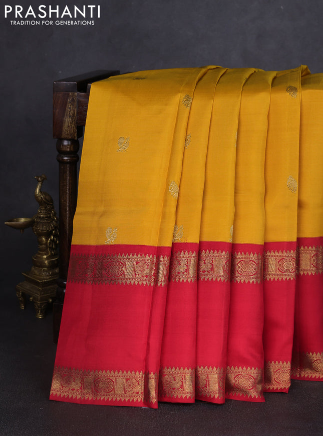 Pure kanchipuram silk saree mango yellow with annam & elephant zari woven buttas and ganga jamuna border