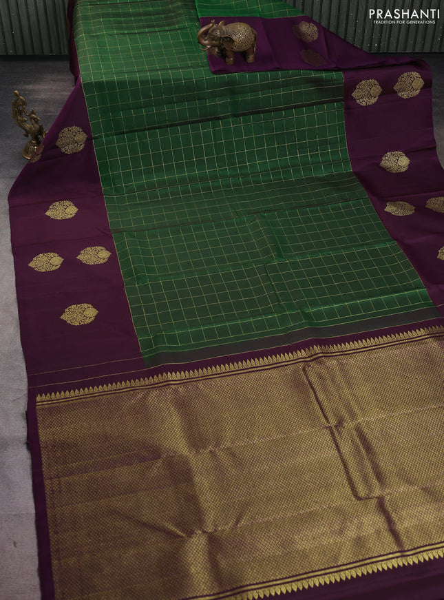 Pure kanchipuram silk saree green and purple with allover zari checked pattern and long zari woven butta border