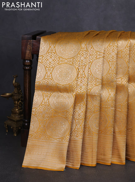 Banarasi uppada silk saree mustard yellow with allover zari woven brocade weaves and zari woven border
