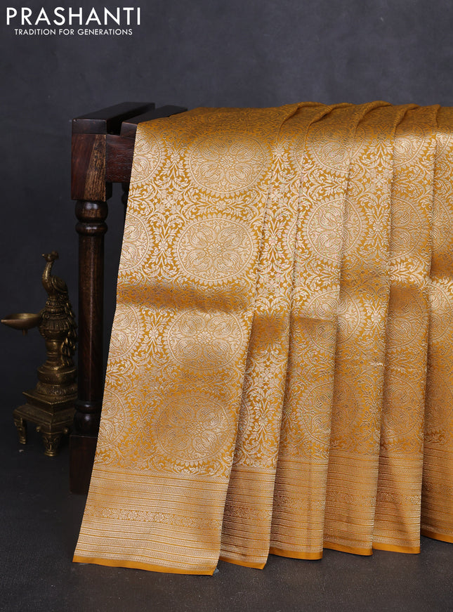 Banarasi uppada silk saree mustard yellow with allover zari woven brocade weaves and zari woven border