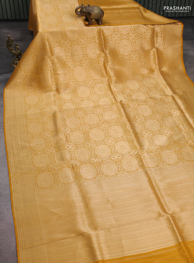 Banarasi uppada silk saree mustard yellow with allover zari woven brocade weaves and zari woven border