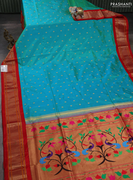 Pure paithani silk saree dual shade of teal bluish green and red with allover zari woven buttas and paithani weaving pallu