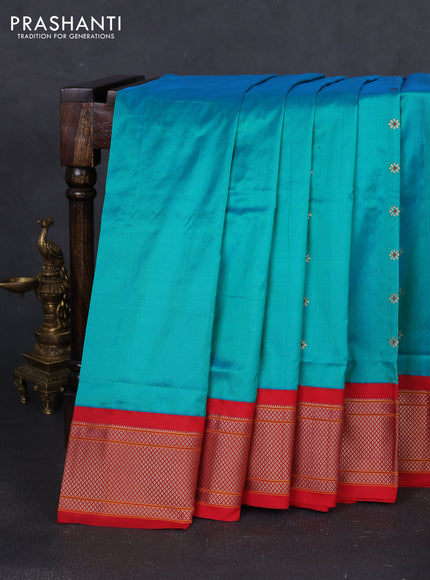Pure paithani silk saree dual shade of teal bluish green and red with allover floral zari woven buttas and paithani weaving pallu