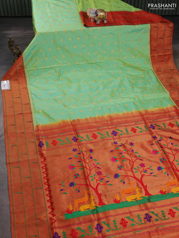 Pure paithani silk saree dual shade of pista green and red with allover zari woven floral buttas and zari woven muniya butta border