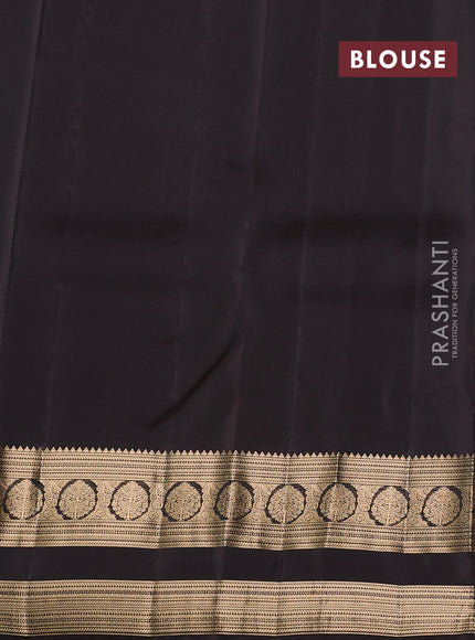 Kanchipuram silk saree green and coffee brown with allover zari woven butas and rettapet zari woven border