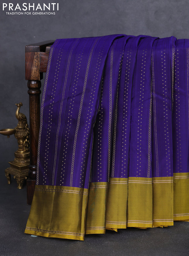 Kanchipuram silk saree blue and mehendi green with allover zari stripes patern & buttas and rettapet zari woven border