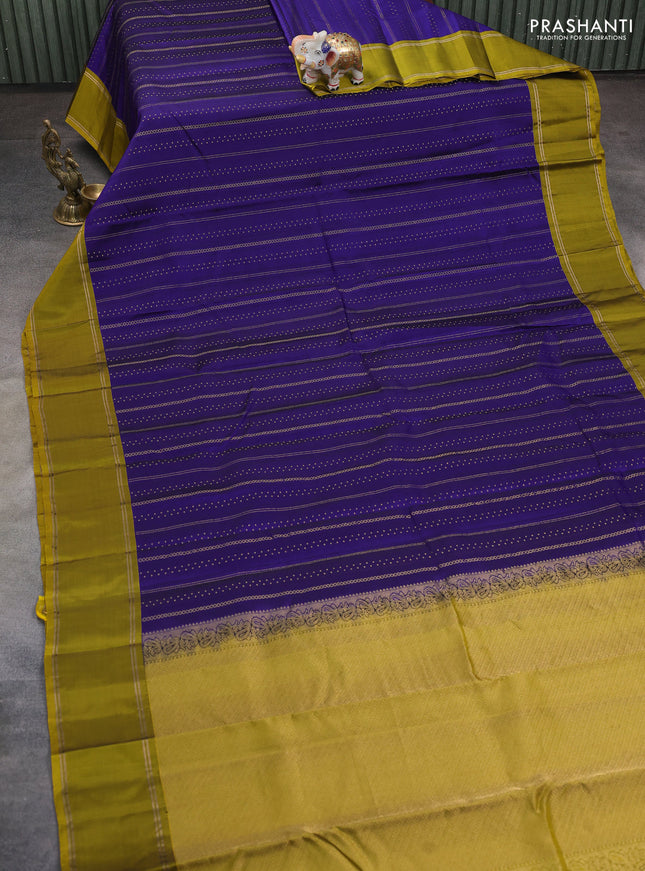 Kanchipuram silk saree blue and mehendi green with allover zari stripes patern & buttas and rettapet zari woven border