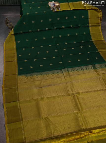 Kanchipuram silk saree green and mustard green with temple zari woven buttas and rettapet zari woven border