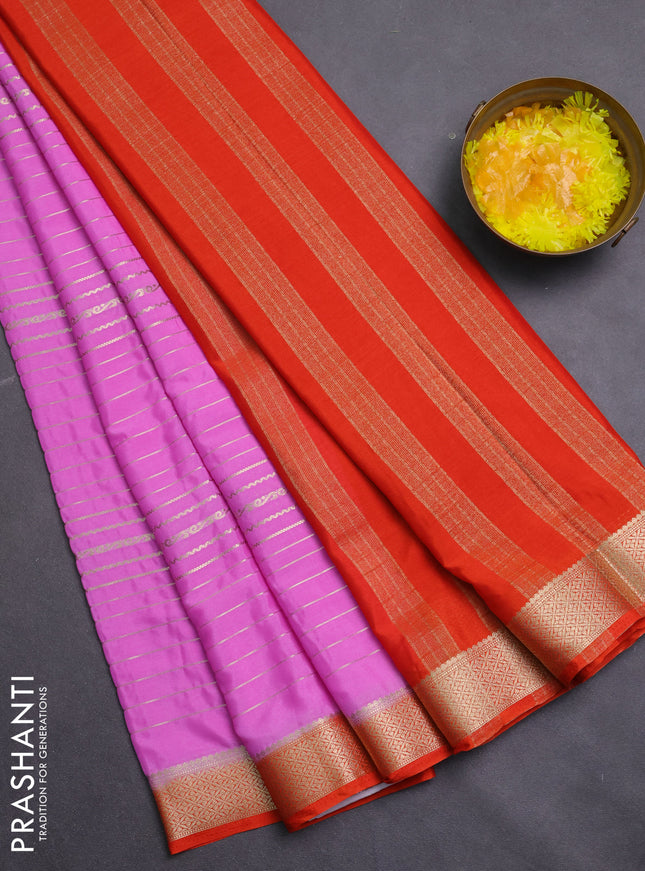 Semi mysore silk saree lotus pink and orange with allover zari weaves and zari woven border