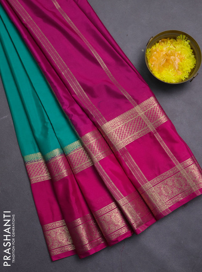 Semi mysore silk saree teal green and pink with plain body and rettapet zari woven border