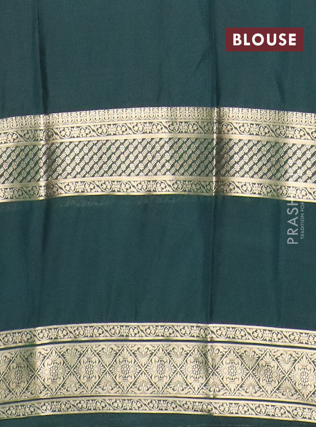 Semi mysore silk saree orange and bottle green with plain body and rettapet zari woven border