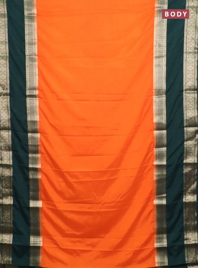 Semi mysore silk saree orange and bottle green with plain body and rettapet zari woven border