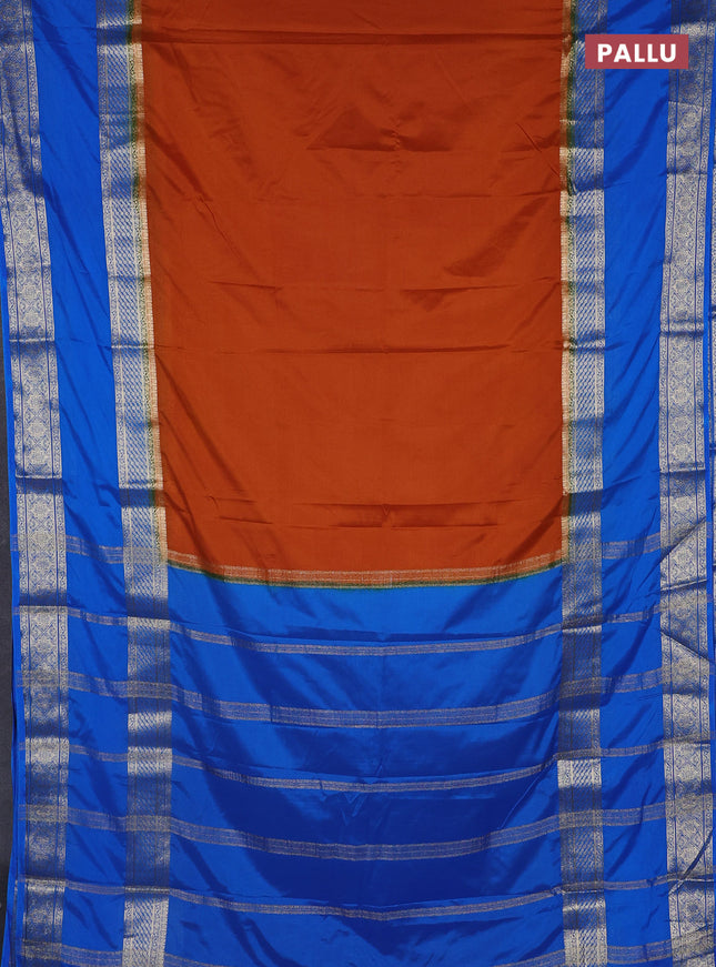 Semi mysore silk saree dark mustard and cs blue with plain body and rettapet zari woven border