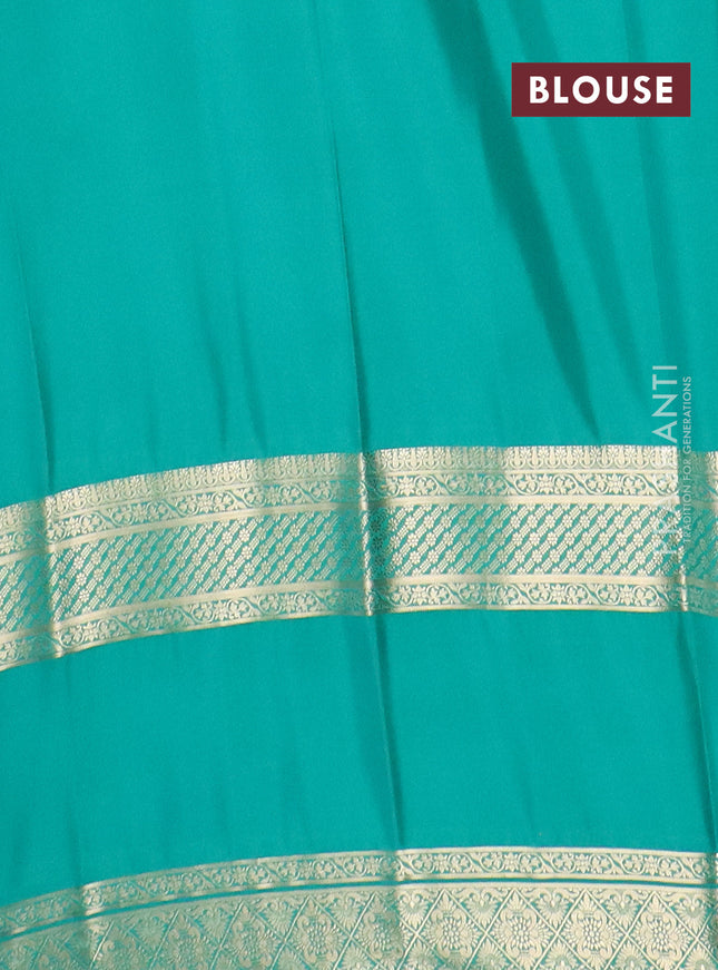 Semi mysore silk saree magenta pink and teal green with plain body and rettapet zari woven border
