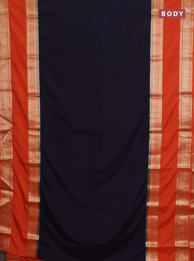Semi mysore silk saree black and rust shade with plain body and rettapet zari woven border