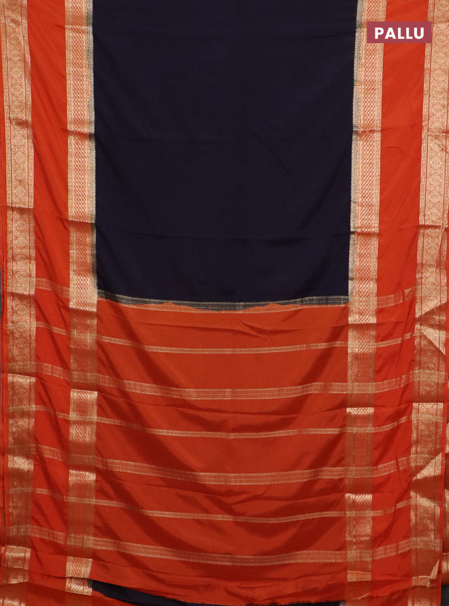 Semi mysore silk saree black and rust shade with plain body and rettapet zari woven border