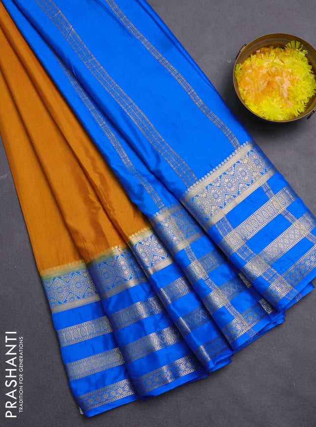 Semi mysore silk saree mustad yellow and blue with plain body and long zari woven border