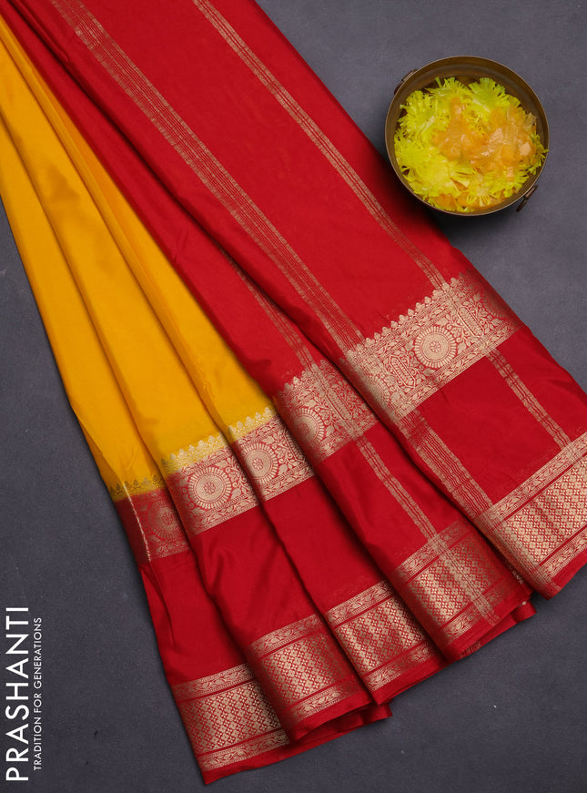 Semi mysore silk saree yellow and red with plain body and rettapet zari woven border