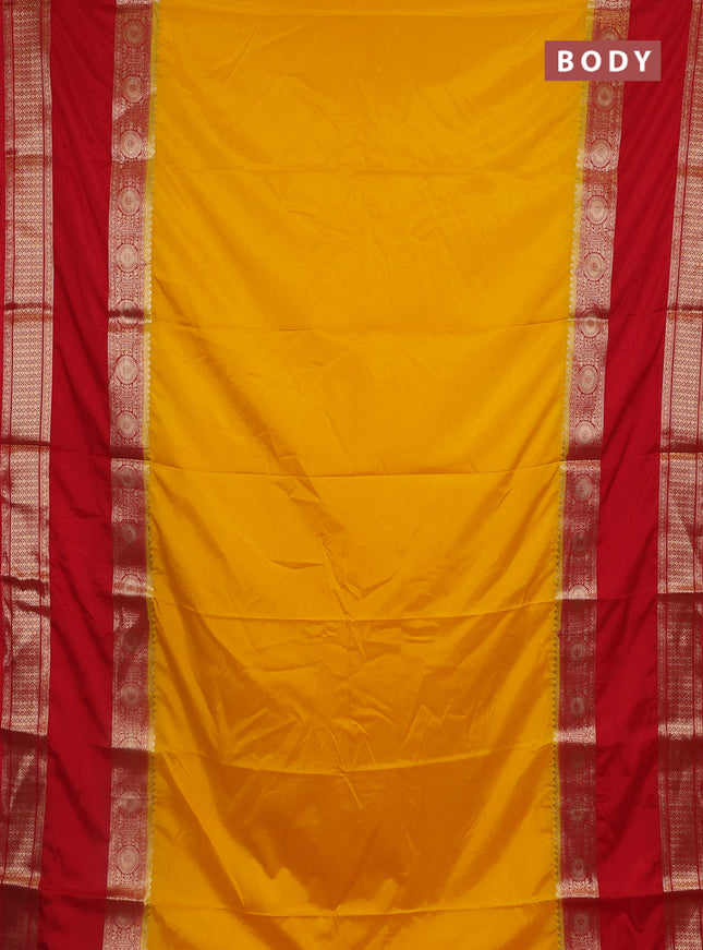 Semi mysore silk saree yellow and red with plain body and rettapet zari woven border