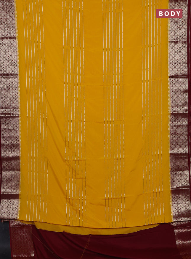 Semi mysore silk saree yellow and maroon with allover zari weaves and zari woven border