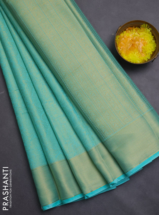 Semi mysore silk saree teal green with allover zari woven brocade weaves and zari woven border