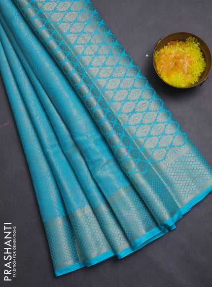 Semi mysore silk saree teal blue with allover zari woven brocade weaves and zari woven border