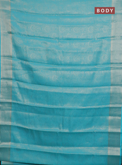 Semi mysore silk saree teal blue with allover zari woven brocade weaves and zari woven border