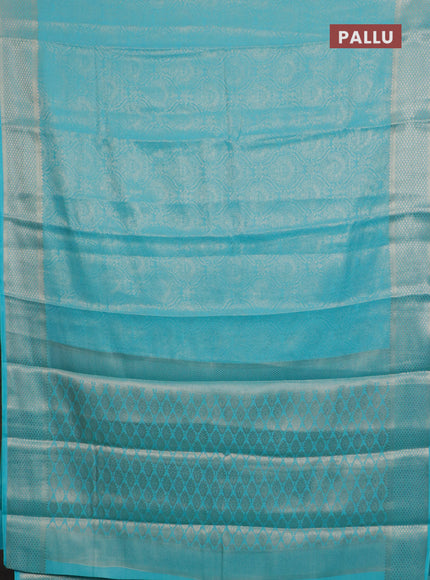 Semi mysore silk saree teal blue with allover zari woven brocade weaves and zari woven border