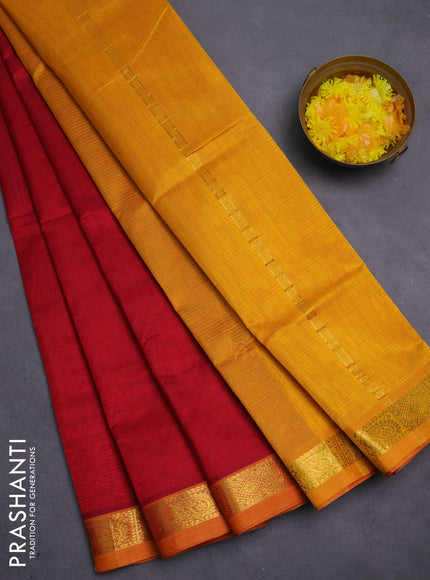 Silk cotton saree maroon and mustard yellow with plain body and zari woven border