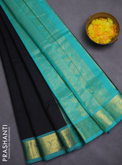 Silk cotton saree black and teal green with plain body and zari woven border