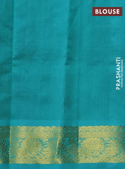 Silk cotton saree black and teal green with plain body and zari woven border