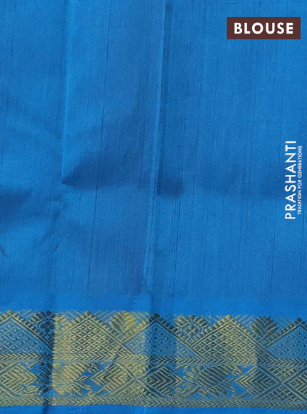 Silk cotton saree maroon and cs blue with plain body and zari woven border