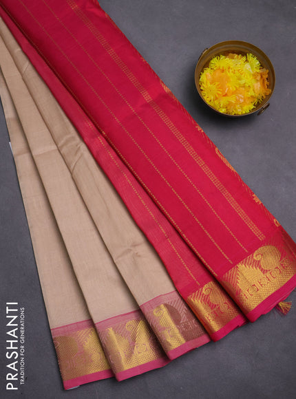 Silk cotton saree beige and pink with plain body and temple & paisley zari woven butta border