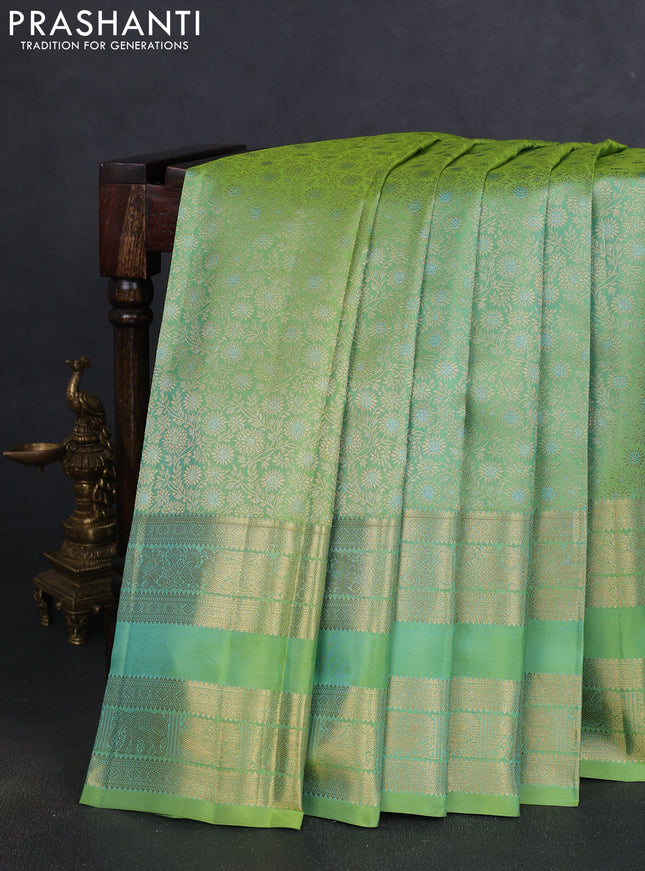Pure kanchipuram silk saree dual shade of light green with allover zari woven brocade weaves and long rettapet zari woven border