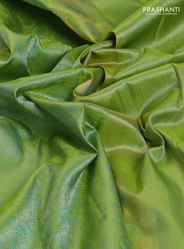 Pure kanchipuram silk saree dual shade of light green with allover zari woven brocade weaves and long rettapet zari woven border