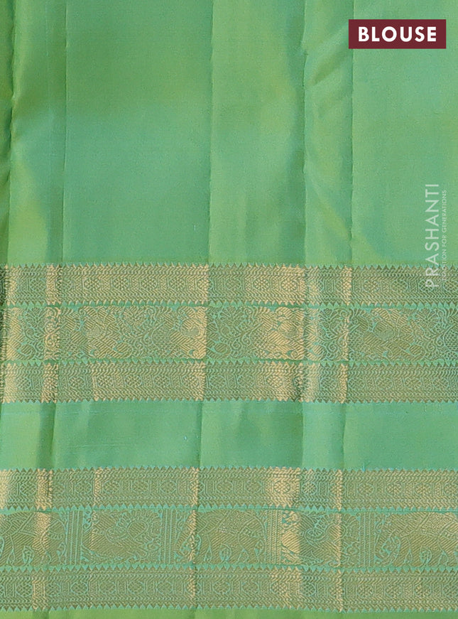 Pure kanchipuram silk saree dual shade of light green with allover zari woven brocade weaves and long rettapet zari woven border