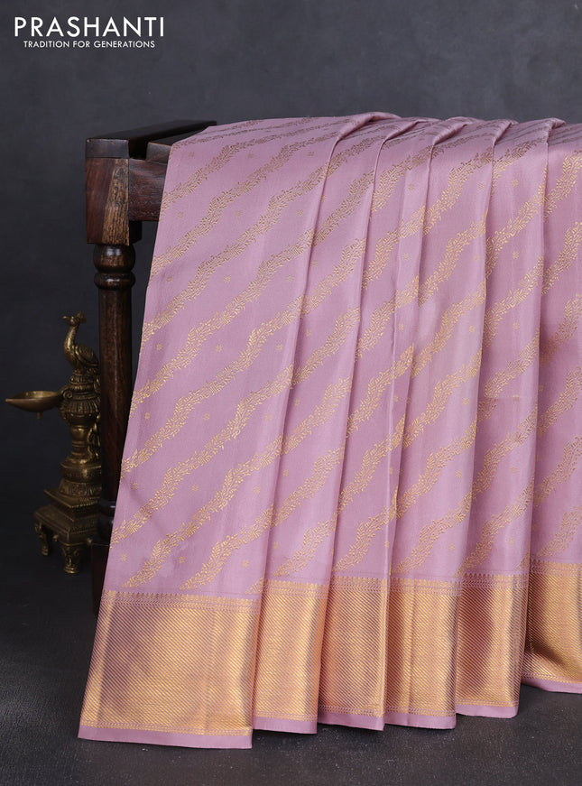 Pure kanchipuram silk saree pastel pink with allover zari leheriya weaves and rich zari woven border